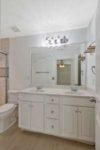 This renovated primary ensuite bathroom is luxurious and beautiful!