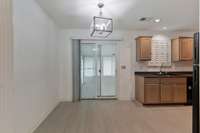 Eat in kitchen with convenient access to the enclosed sunroom!