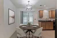 Virtually staged. The eat in kitchen is just the right space to enjoy culinary creations! For a more formal experience, choose to eat in the dining room!