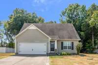 Park in your paved driveway, or in your 2 car attached garage!