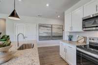 *Photo taken of model home. Colors & selections may vary*