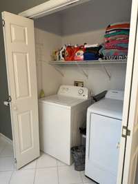 Laundry located in Large bathroom.  Washer and dryer to remain.