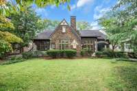 Welcome to one of Nashville’s Premier InTown A A A Cherokee Park Classic Tudor Revival Residence is replete w Stone Accents Stucco Highlights Brick Detailing Abundant Windows typify Tudor Revival