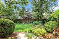 Mature Landscaping enhances the privacy of this yard