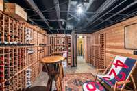 A perfect retreat for your guests to sneak a peak at your collection     There is additional storage and workshop as well as a second laundry in the lower level