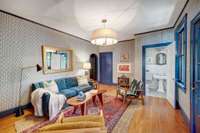 Den adjacent to the Kitchen and French Door to Screen Porch plus a Vintage Half Bath and closet