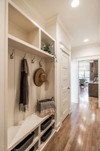 Entry from the garage includes a landing pad for your shoes, bags, jackets and keys.