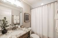 Upstairs full bathroom with tub/shower.