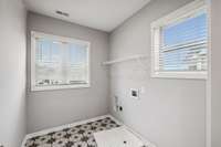 Beautiful Natural Light in Your Oversized Laundry/Utility Room with Ceramic Tile.