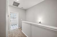 Oversized Laundry/Utility Room - Located Just at the top of the stairs, Centrally Located to all 3 Bedrooms.