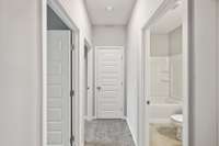 Linen Closet Located at the end of the hall, Separating Bedrooms 2 & 3 from the Secondary Bath.