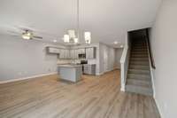Open Concept Kitchen/Great Room Area that Also Promotes a Formal Dining Space.
