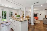 Kitchen opens to the living room and includes french doors out to the patio area.