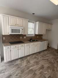 Kitchen needs to be updated. I am in the process of getting some kitchen replacement costs so you can make a good decision on upgrading this space. If the kitchen was perfect, this house would be close to a $1,000,000 asking price.