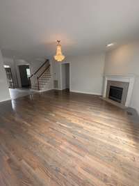 Another view of the living room and the floor color...I think they look super cool