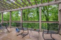 Great view of woods or you can see down the hill to a clearing by a creek at the back of the property.