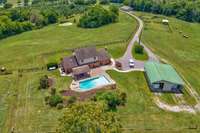 1361 Madison Creek Rd is being sold with 1357 Madison Creek Rd for combined 2 homes and 50 acres.