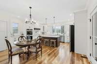 Chef's kitchen has direct access to covered back porch when you're ready to take the party outside!