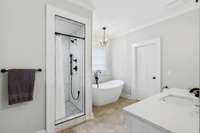 Primary on-suite bath with custom tiled shower and soaking tub!