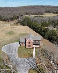 Additional drone footage of level cleared back acreage