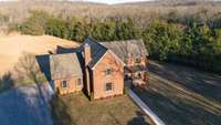 Aerial photo of home site and back acreage