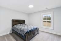 Bedroom 3 w/ views of back acreage