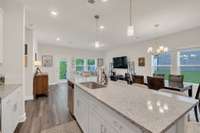 Open concept living - and all the extra light with the windows of the end unit.