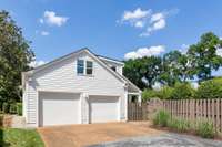 The left garage door is taller to accommodate a taller than average vehicle