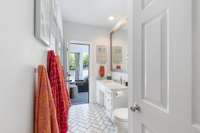 Back downstairs this is the second powder room. Access from the house or back porch...it's the Pool Bath...