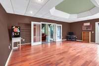 22x16 family room.  French doors enter the second room in this space currently used as a bedroom. Potential for inlaw suite, extended family, home business, home school, return it to a studio...so flexible.