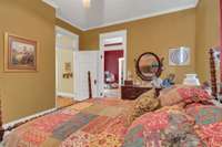 Looking toward the foyer on the right and the doorway into the second room adjoining this bedroom.    See the floorplan attached in the mls