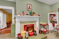 Sweet fireplace in the kitchen.