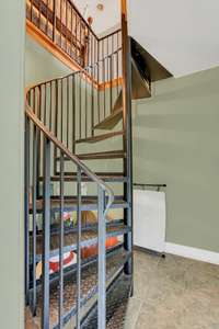 Second staircase to upstairs is a pretty spiral one.