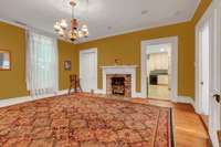 17X16 Dining room with fireplace, hardwood floors.