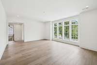 Oversized bonus room with tons of natural light. Ceiling to floor Pella windows