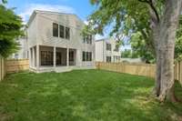 Awesome backyard space. Huge walk-out covered patio overlooking fenced back yard space. Equipped with custom lighting and ceiling fan to keep cool on hot days
