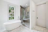 Spa-like Luxury stand alone tub and separate oversized shower with custom lighting and tile selections