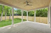 Huge walk-out covered patio overlooking fenced back yard space. Equipped with custom lighting and ceiling fan to keep cool on hot days