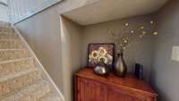 This nook is just inside the door from the garage. What a perfect spot for a drop zone.  Just a few hooks and bench and you are set!