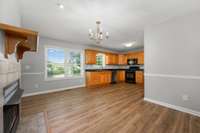 Neutral paint continues as does the vinyl hardwood floors and natural light.