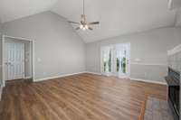 Neutral paint, ceiling fan, vinyl hardwood floors.
