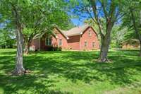 One level living with a large bonus room upstairs.