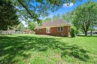 Room to roam with mature shade trees to boot!