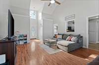 Living Room also has 18' ceilings and an entry way entering the home