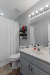 LVP flooring, fresh paint, new toilet and exhaust fan