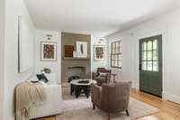 The focal point of the formal living room is the lime plastered gas fireplace.