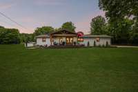 Lovely setting on 13.38 acres with ample open pasture AND woodlands with cut trails!