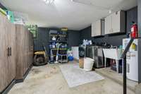 So much storage and space in the converted garage laundry/utility room