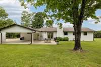 Two car carport with so much space to park vehicles, boat, trailer and or an RV