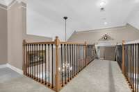 great skybridge over kitchen and breakfast room leading to Bonus room